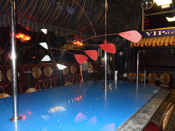 Calder in a strip club
